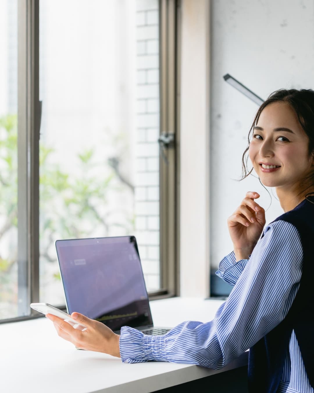 Jennifer Bradley working at her desk